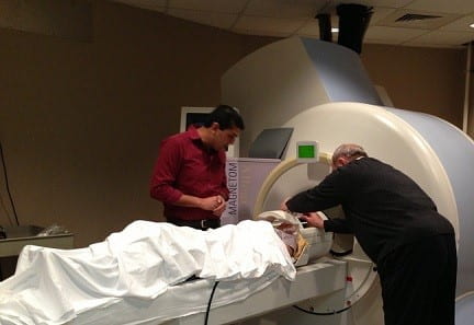 A participant performing task inside fMRI